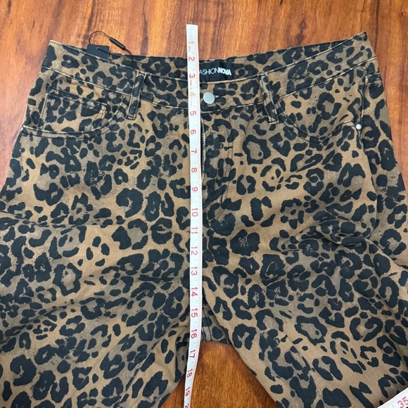 Fashion Nova Cheetah Pants Womens Flared Size 13 - Picture 9 of 11